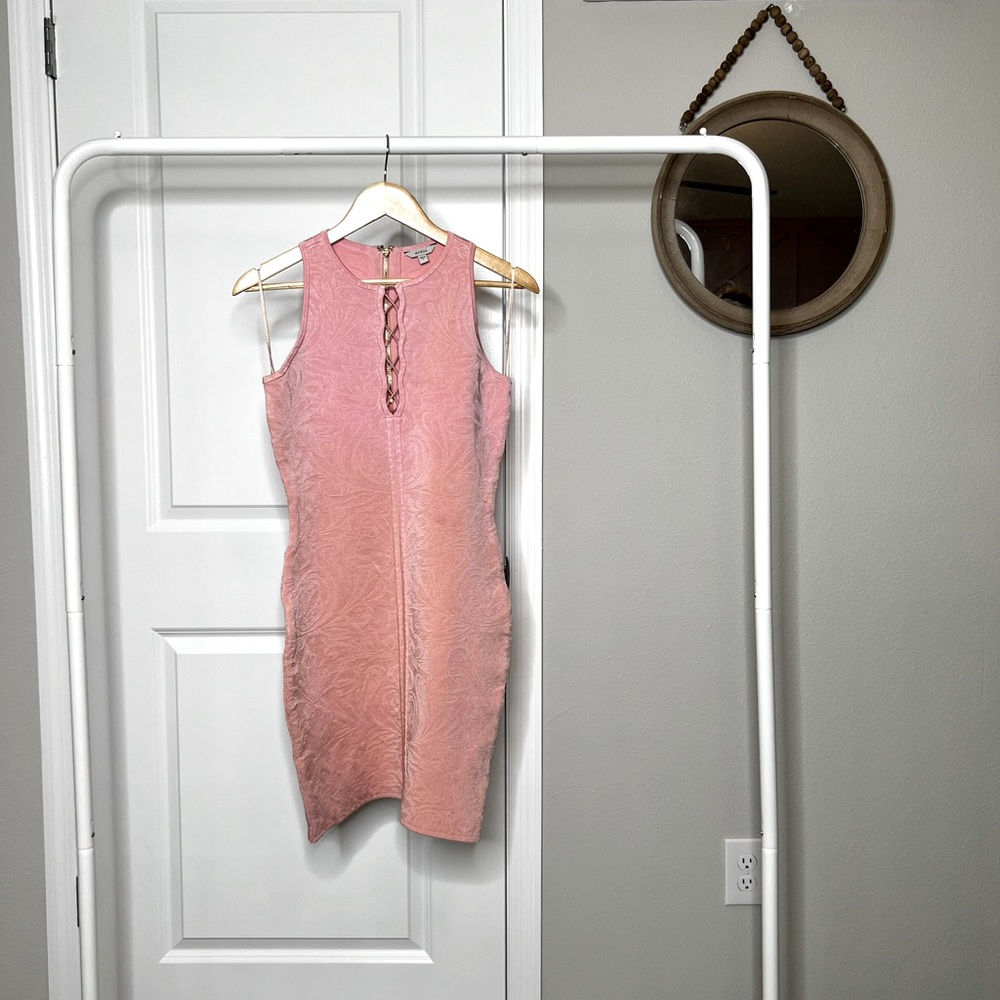 Body hugging lace up cocktail dress